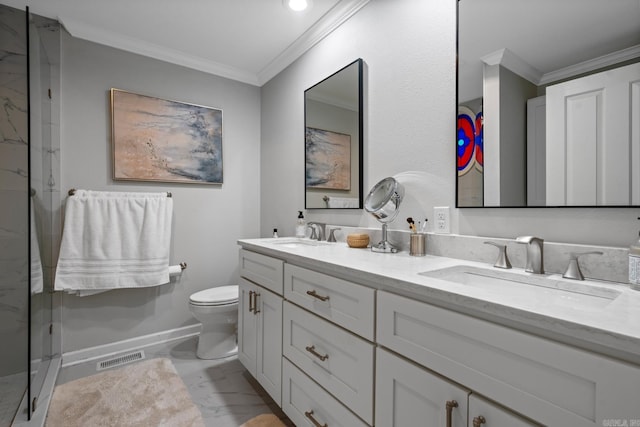 bathroom with vanity, toilet, crown molding, and a shower with shower door