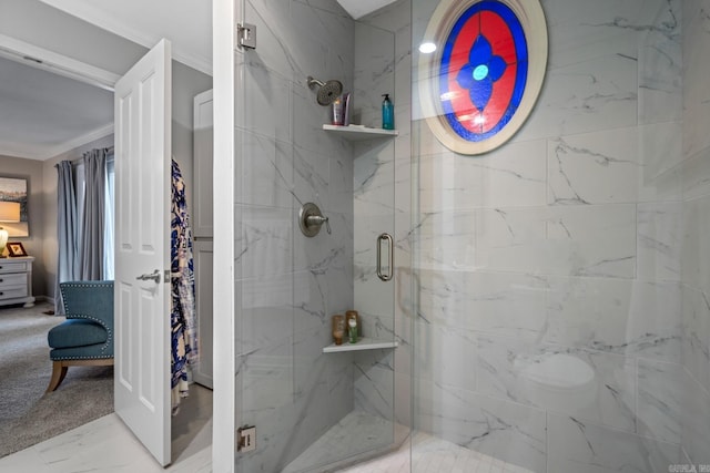 bathroom with crown molding and an enclosed shower