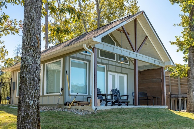 view of property exterior featuring a lawn