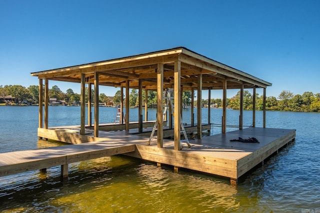 view of dock with a water view