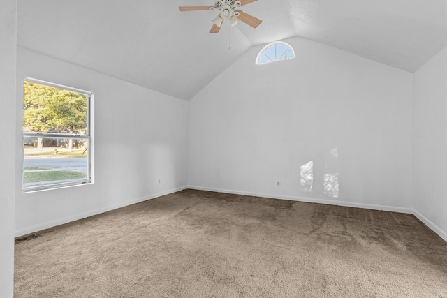 additional living space featuring carpet, vaulted ceiling, and ceiling fan