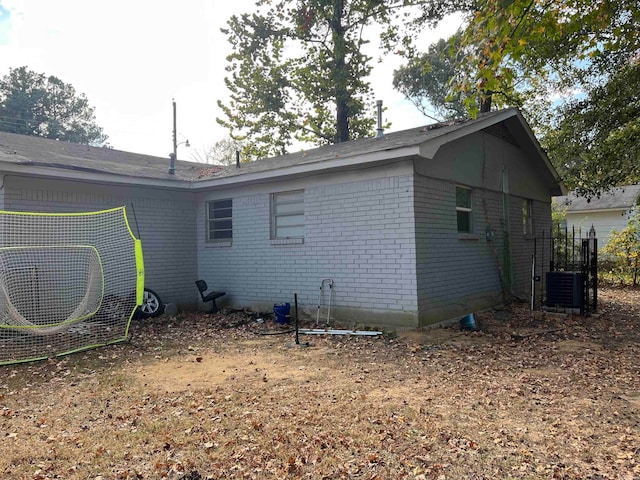 view of home's exterior featuring central air condition unit