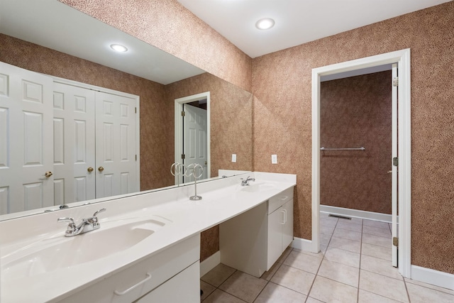 bathroom with vanity and tile patterned flooring