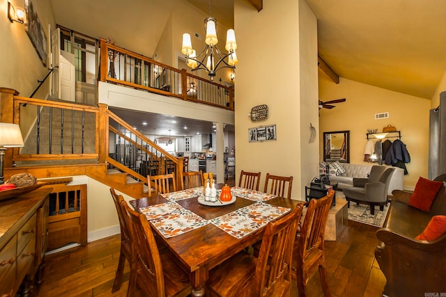 dining area featuring beamed ceiling, high vaulted ceiling, dark hardwood / wood-style floors, and ceiling fan with notable chandelier