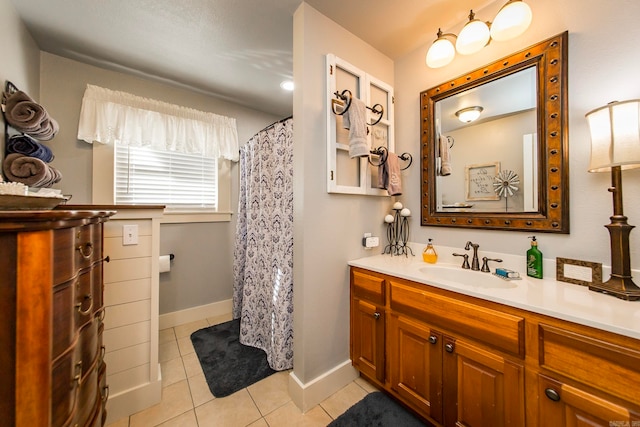 bathroom with vanity and tile patterned flooring