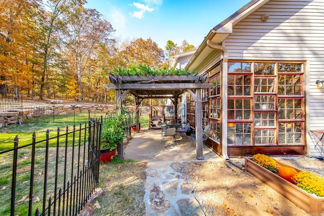 view of patio featuring a pergola