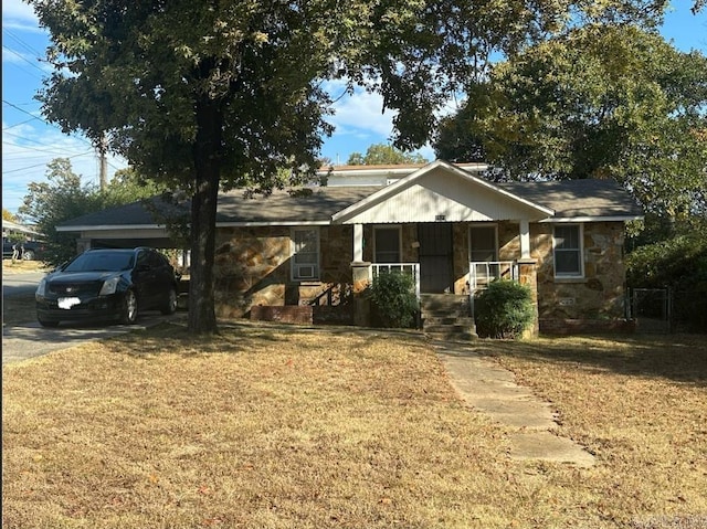 view of front of home featuring a front lawn and a porch