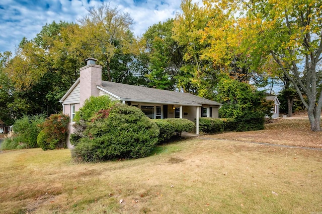 exterior space featuring a lawn