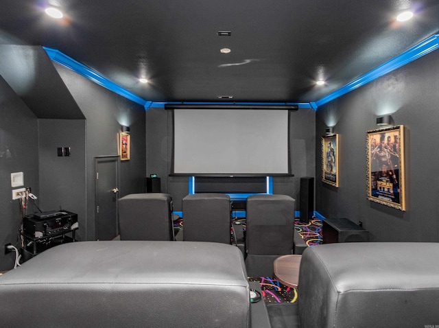 home theater room featuring ornamental molding