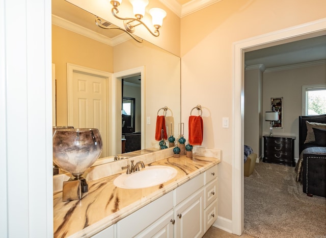 bathroom with vanity and ornamental molding