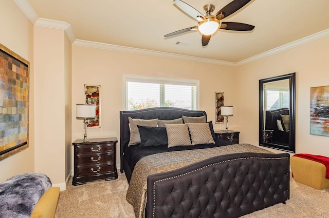 bedroom featuring ornamental molding, light colored carpet, and ceiling fan