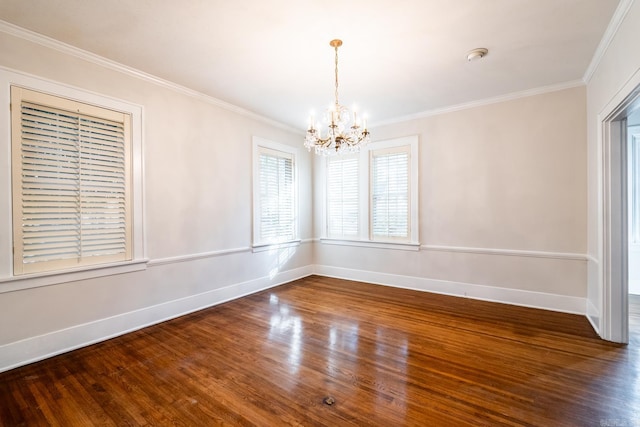 unfurnished room featuring dark wood-type flooring, crown molding, and an inviting chandelier