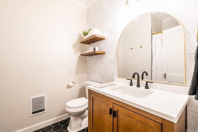 bathroom with toilet, crown molding, vanity, and heating unit