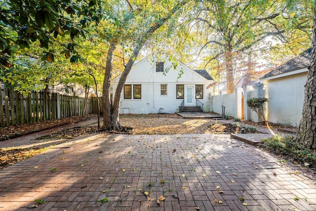 view of front of home with a patio