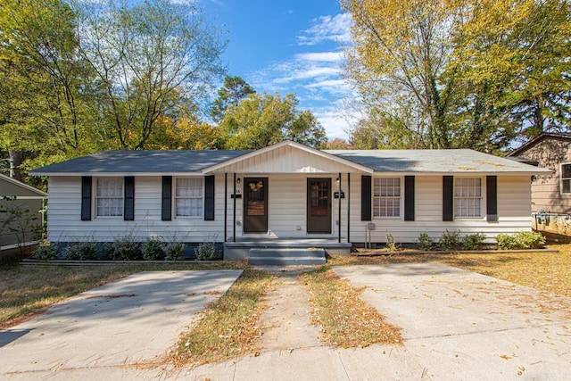 single story home featuring covered porch