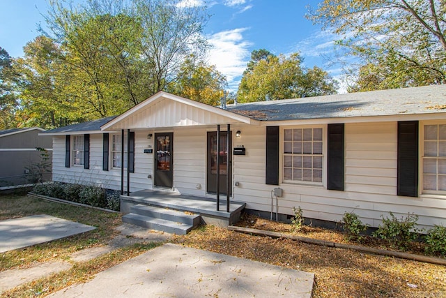 ranch-style home with a porch