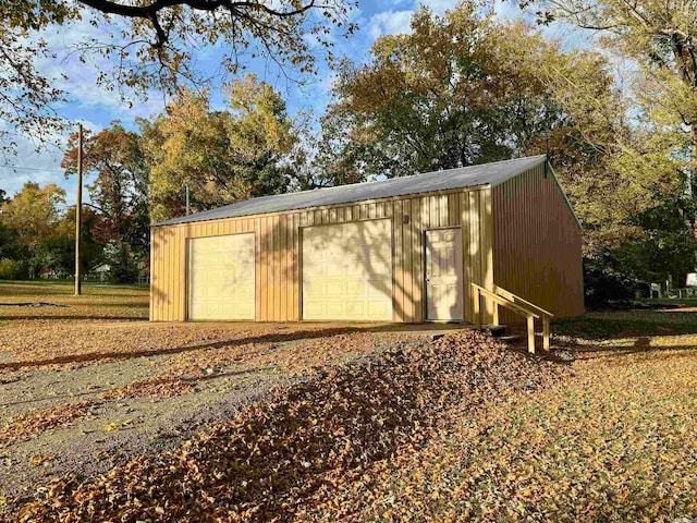 view of outdoor structure with a garage