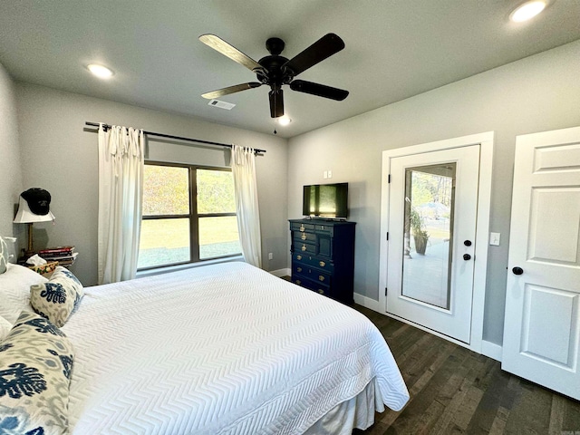 bedroom with dark hardwood / wood-style floors, access to outside, and ceiling fan