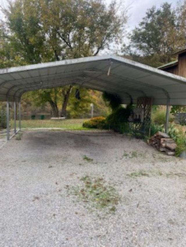 view of car parking featuring a carport