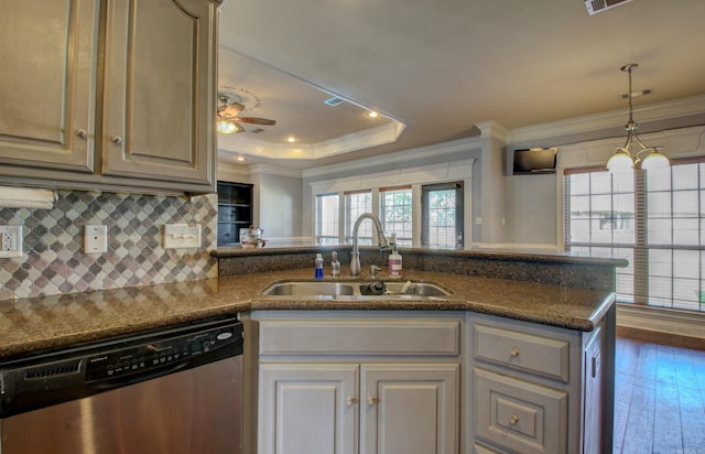 kitchen featuring kitchen peninsula, stainless steel dishwasher, ornamental molding, dark wood-type flooring, and sink