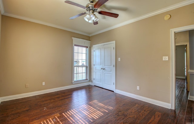 unfurnished room featuring ornamental molding, dark hardwood / wood-style floors, and ceiling fan