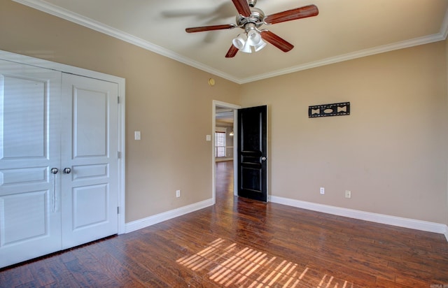 unfurnished bedroom featuring dark wood-type flooring, ceiling fan, a closet, and ornamental molding