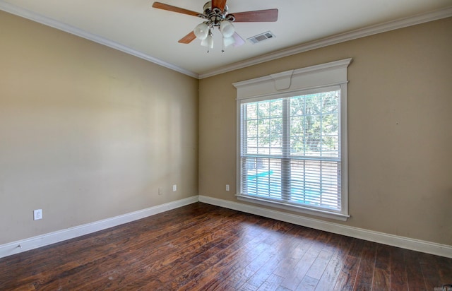 spare room featuring crown molding, dark hardwood / wood-style floors, and ceiling fan