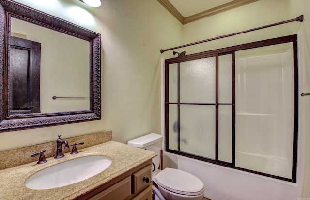 full bathroom with toilet, ornamental molding, bath / shower combo with glass door, and vanity