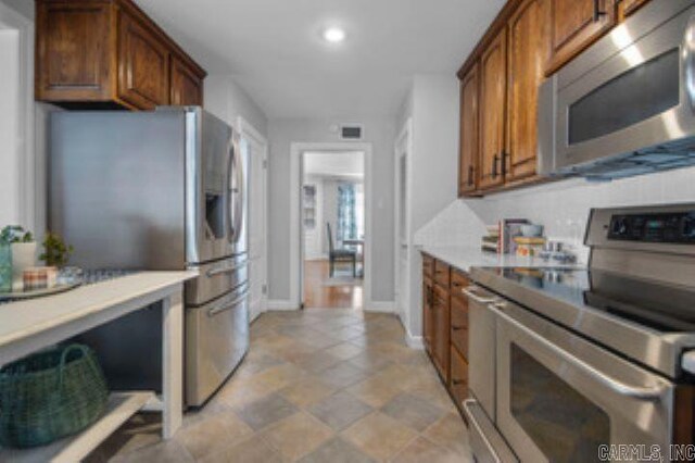 kitchen featuring appliances with stainless steel finishes