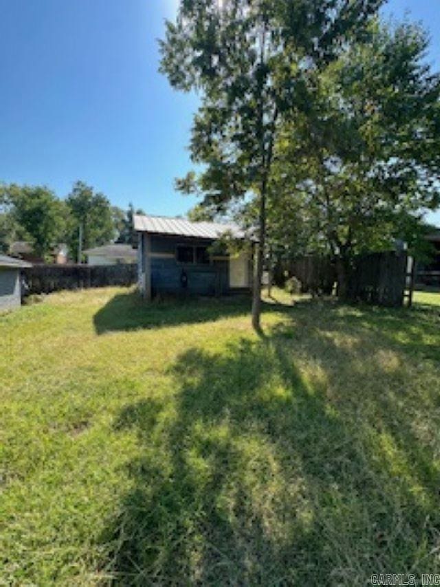 302 Center St, Rison, AR 71665 - view of yard featuring fence