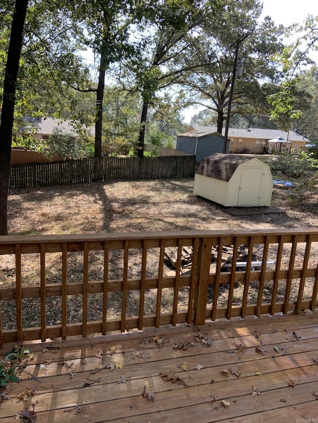 wooden deck with a storage unit