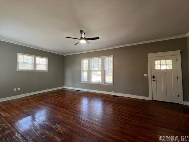 919 E Hamilton Ave, Wynne, AR 72396 - interior space with baseboards, ceiling fan, ornamental molding, and wood finished floors