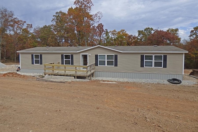 view of front of house featuring a wooden deck