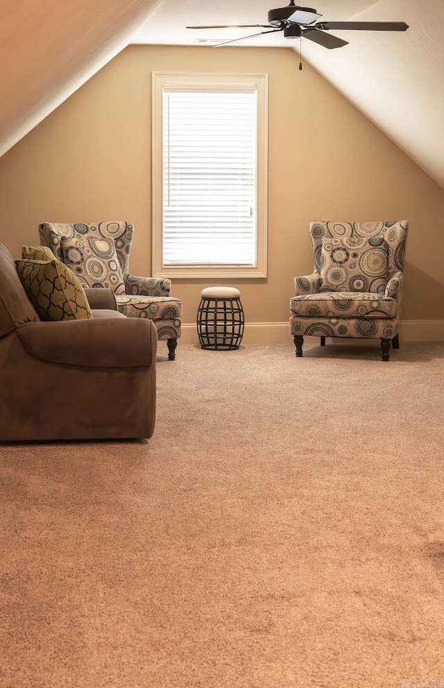 sitting room featuring lofted ceiling, carpet flooring, and ceiling fan