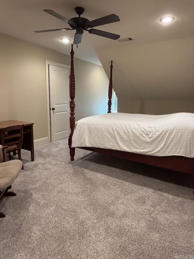 bedroom featuring lofted ceiling, carpet floors, and ceiling fan