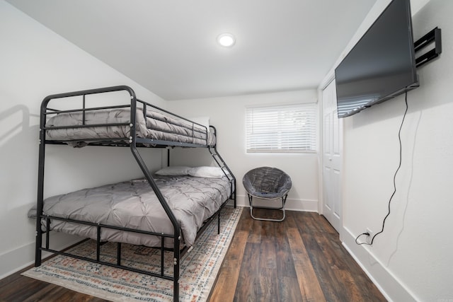 bedroom featuring dark hardwood / wood-style flooring