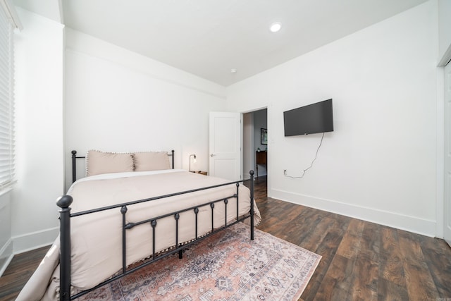 bedroom featuring dark hardwood / wood-style floors