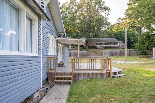 deck featuring a yard