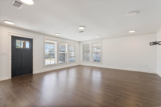 entrance foyer with dark hardwood / wood-style floors