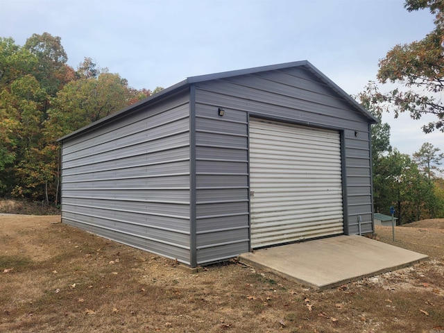 view of outdoor structure featuring a garage