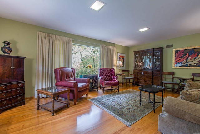 living room with light hardwood / wood-style floors