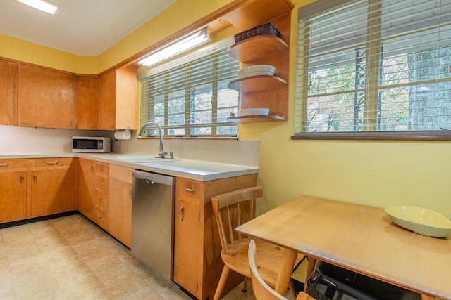 kitchen featuring appliances with stainless steel finishes and sink