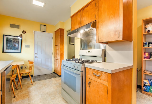 kitchen featuring white gas stove