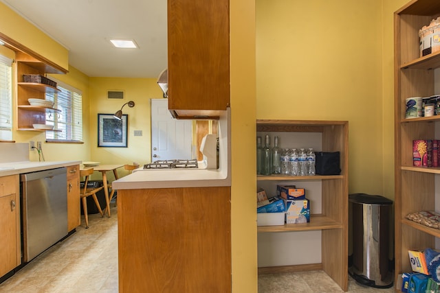 kitchen with stainless steel dishwasher