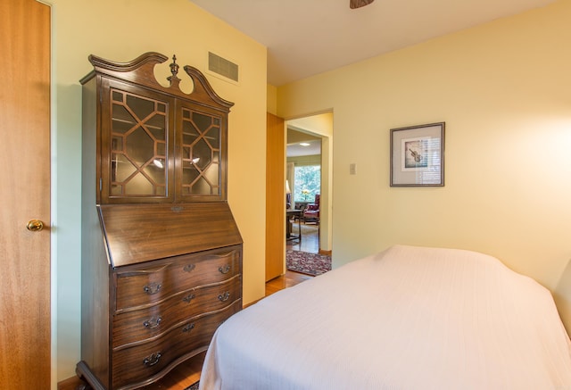 bedroom featuring wood-type flooring