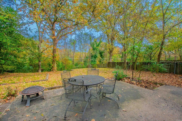 view of patio with a fire pit