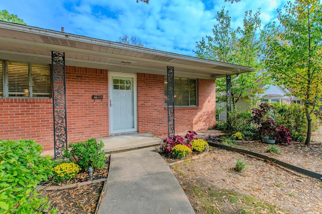 entrance to property with a porch