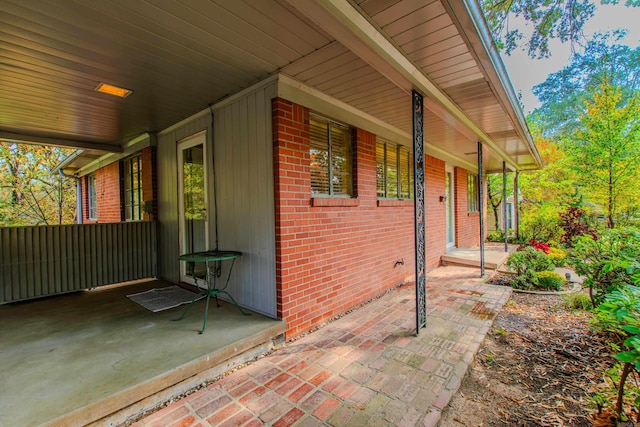 view of patio featuring a porch