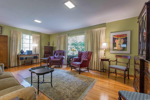 living room with light hardwood / wood-style floors