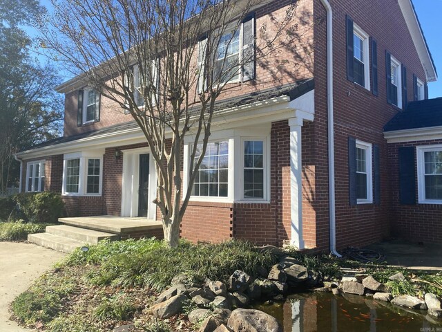 301 Reine St, Mena, AR 71953 - view of front of house featuring brick siding